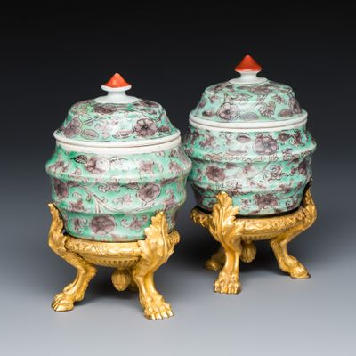 *A pair of fine ormolu-mounted Chinese famille verte barrel-shaped jars and covers, Kangxi